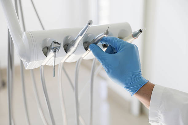 Professional Dental Implants technician working in Bellefonte, DE